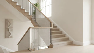 A modern fabric safety gate blending into a beautifully designed staircase