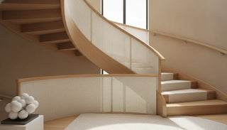 Neutral fabric safety barrier across a modern staircase
