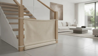 Stylish fabric safety gate installed on a staircase in a modern home, no drilling required