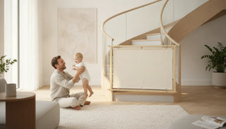 Wide fabric safety gate spanning a banister-to-banister staircase opening