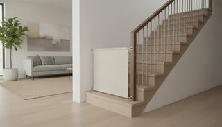 Extra wide fabric safety gate fitted between a wall and banister