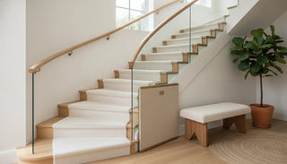 Modern staircase with a discreet fabric safety gate for babyproof stairs