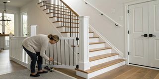 Woman installing a stairway gate on a banister using a gate installation kit.