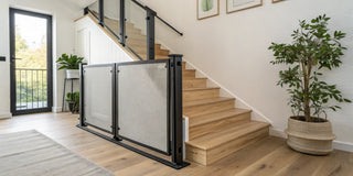 Best retractable stair gate on wooden stairs in a stylish home.