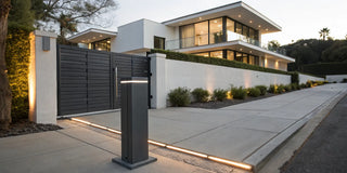 A modern barrier gate installed at the top of a staircase in a stylish home.