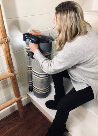 Woman Mounting Baby Gate